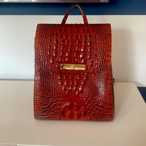 Woman’s used Brahmin backpack purse